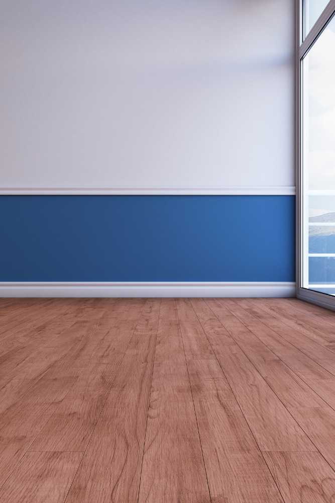 Spacious empty accessory dwelling unit (ADU) with wood flooring, created by Nativi Construction in Ventura County.